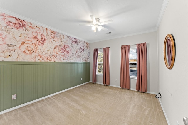 10106 Holly Chase Dr, Houston, TX 77042 - carpeted empty room featuring crown molding, ceiling fan, a wainscoted wall, and baseboards