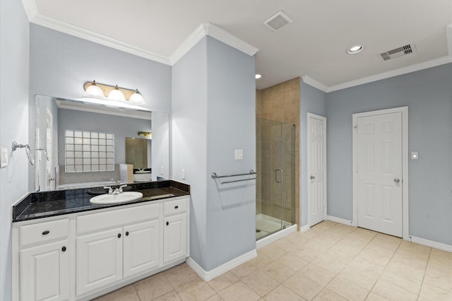 10106 Holly Chase Dr, Houston, TX 77042 - bathroom with ornamental molding, a shower stall, baseboards, vanity, and tile patterned floors