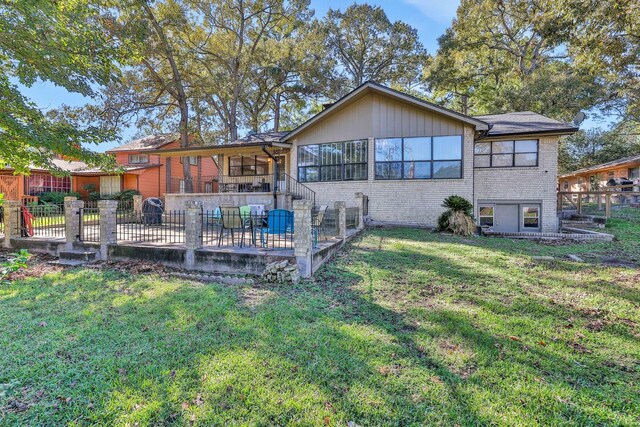 148 S Oak Bluff St, Trinity, TX 75862 - back of property featuring brick siding and a patio area