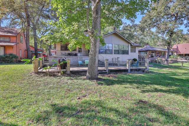 148 S Oak Bluff St, Trinity, TX 75862 - rear view of house featuring a wooden deck