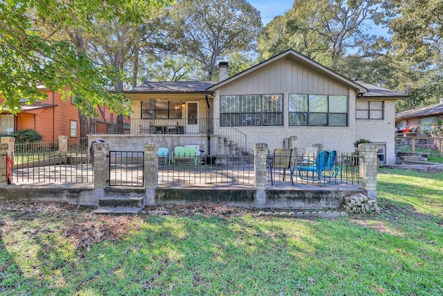 148 S Oak Bluff St, Trinity, TX 75862 - rear view of property with a patio area, brick siding, and a chimney