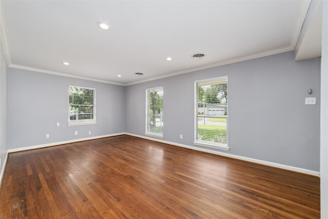 8022 Ridgeview Dr, Houston, TX 77055 - unfurnished room featuring baseboards, ornamental molding, healthy amount of natural light, dark wood-type flooring, and recessed lighting