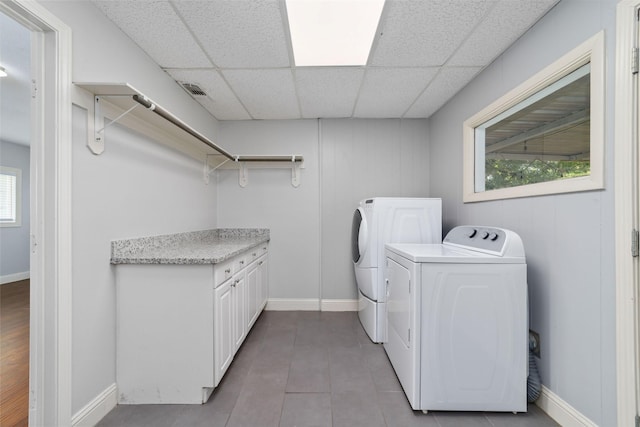 8022 Ridgeview Dr, Houston, TX 77055 - laundry room with independent washer and dryer, healthy amount of natural light, and baseboards