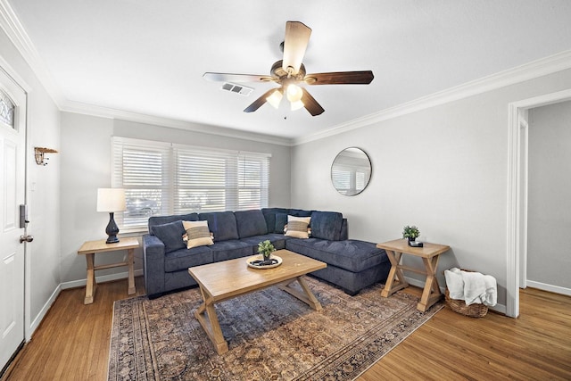 3206 Carter St, Pasadena, TX 77503 - living area with wood finished floors, a ceiling fan, baseboards, and ornamental molding