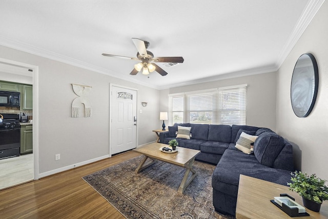 3206 Carter St, Pasadena, TX 77503 - living room with wood finished floors, ceiling fan, crown molding, and baseboards