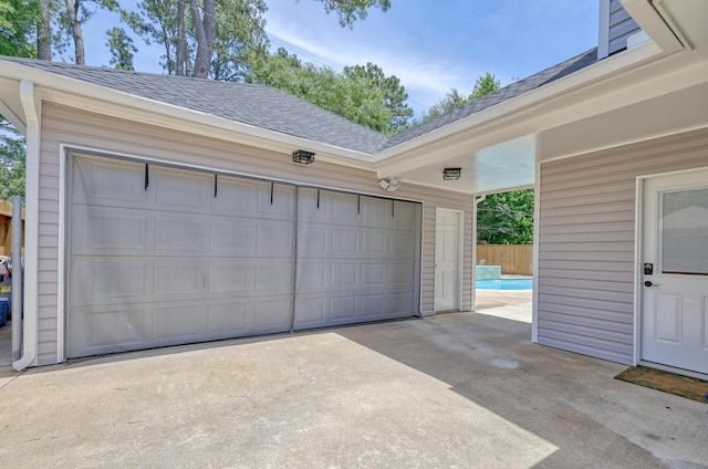 17706 August Meadows Ln, Spring, TX 77379 - garage with concrete driveway