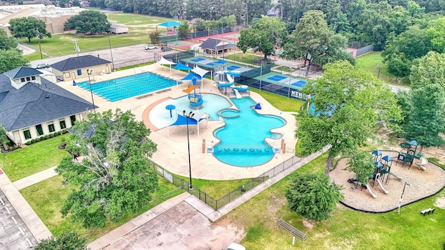 17706 August Meadows Ln, Spring, TX 77379 - bird's eye view of a pool and a tree filled landscape