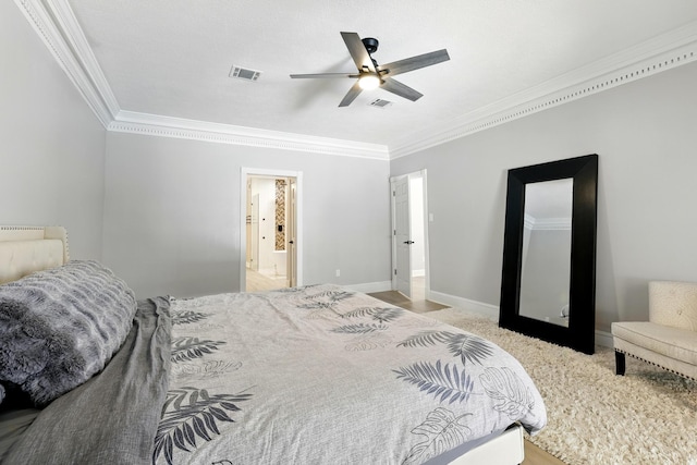 17706 August Meadows Ln, Spring, TX 77379 - bedroom featuring crown molding, baseboards, carpet floors, a ceiling fan, and ensuite bath
