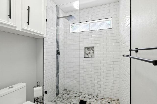 17706 August Meadows Ln, Spring, TX 77379 - full bathroom featuring a shower stall and toilet