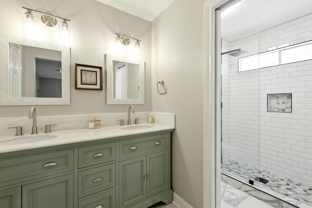 17706 August Meadows Ln, Spring, TX 77379 - bathroom with a shower stall, double vanity, marble look tiles, and baseboards
