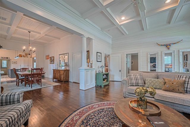 500 W Post Office St, Eagle Lake, TX 77434 - living room featuring coffered ceiling, dark wood-style floors, a chandelier, beam ceiling, and decorative columns