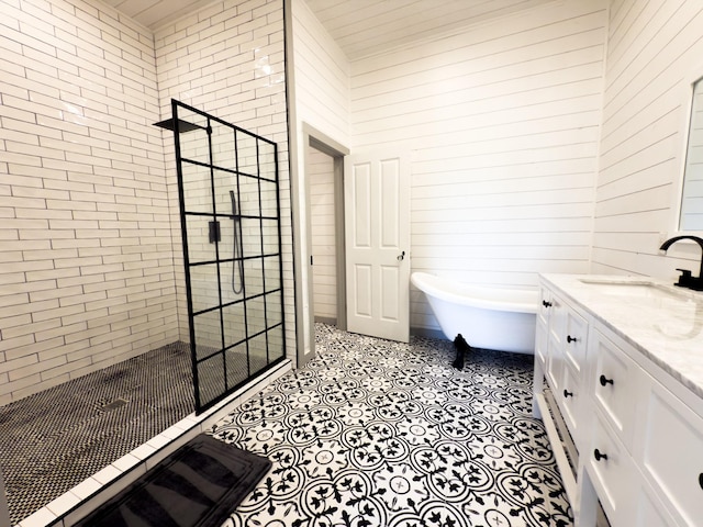 1111 Fm 109, New Ulm, TX 78950 - bathroom with a walk in shower, a freestanding tub, vanity, and wood walls