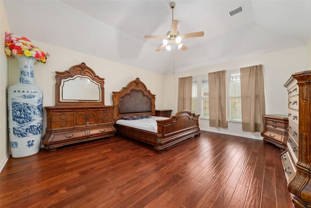 6610 Golden View Ct, Houston, TX 77083 - bedroom with dark wood-style floors, lofted ceiling, a ceiling fan, and baseboards