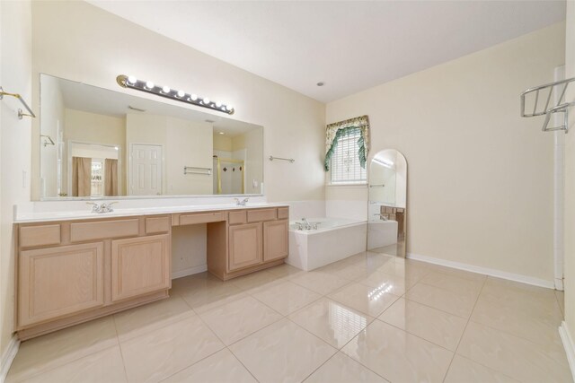 6610 Golden View Ct, Houston, TX 77083 - bathroom with a shower stall, a bath, tile patterned flooring, double vanity, and baseboards