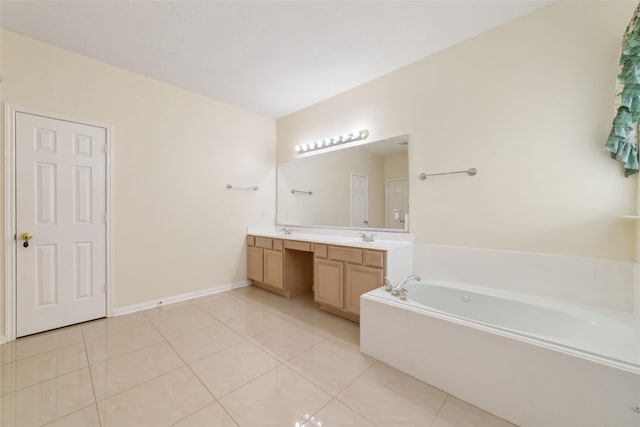 6610 Golden View Ct, Houston, TX 77083 - bathroom featuring double vanity, a garden tub, tile patterned floors, and baseboards