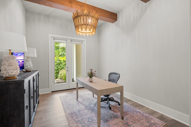 19 Pronghorn Pl, The Woodlands, TX 77389 - office area featuring wood finished floors, a chandelier, and baseboards