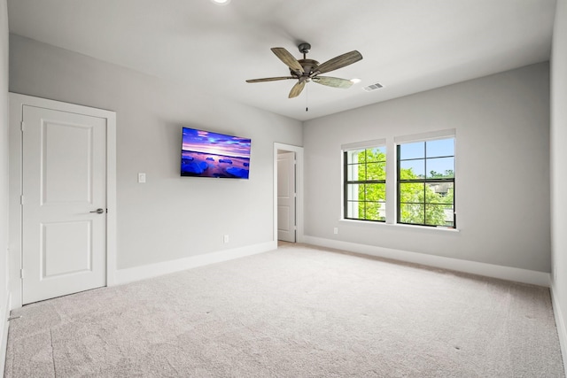 19 Pronghorn Pl, The Woodlands, TX 77389 - unfurnished bedroom featuring carpet flooring, baseboards, and a ceiling fan