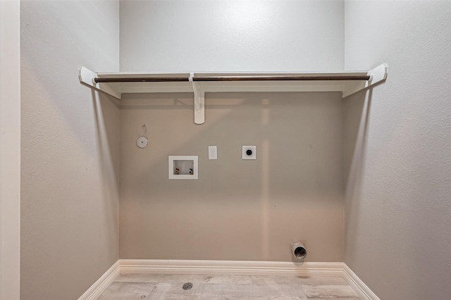 4307 Hershe St, Houston, TX 77020 - laundry room featuring gas dryer hookup, electric dryer hookup, hookup for a washing machine, baseboards, and wood finished floors