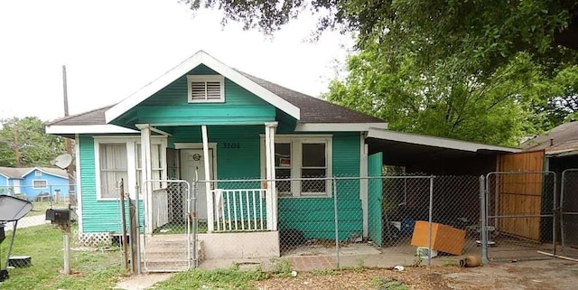 3101 Evella St, Houston, TX 77026 - view of front of property with a porch, a gate, and fence
