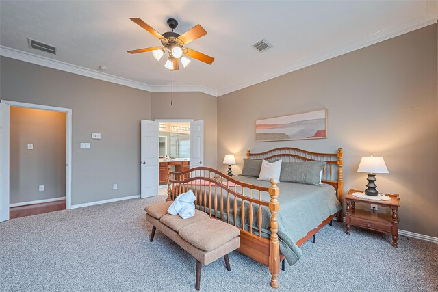 2500 Amy Lee Dr, Conroe, TX 77304 - carpeted bedroom featuring ornamental molding, ensuite bathroom, and a ceiling fan