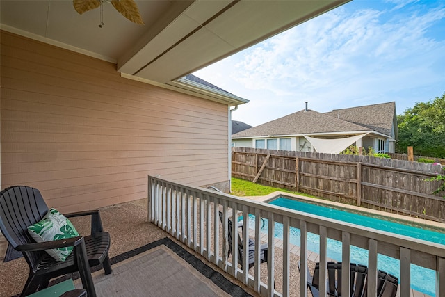 2500 Amy Lee Dr, Conroe, TX 77304 - balcony featuring ceiling fan and view of pool