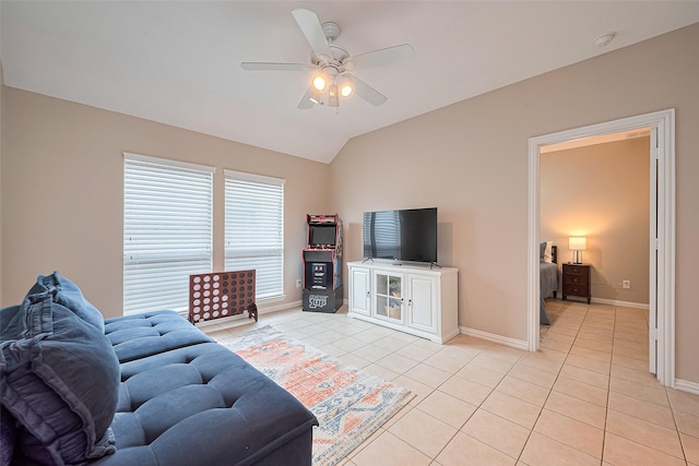 2500 Amy Lee Dr, Conroe, TX 77304 - living room featuring light tile patterned floors, ceiling fan, and vaulted ceiling