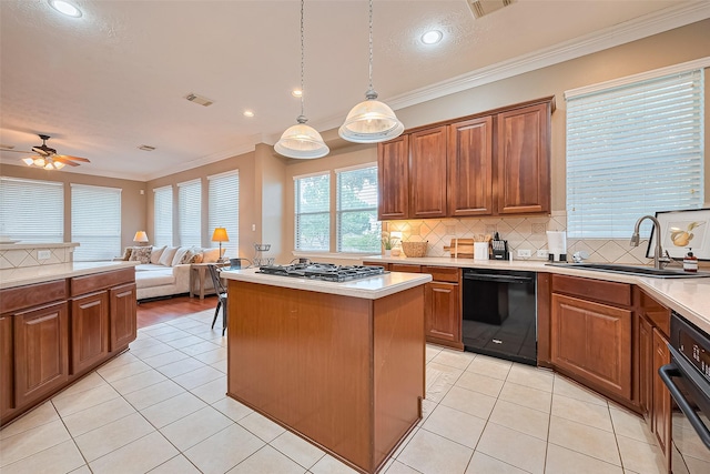 2500 Amy Lee Dr, Conroe, TX 77304 - kitchen with black appliances, light tile patterned flooring, decorative backsplash, light countertops, and ornamental molding