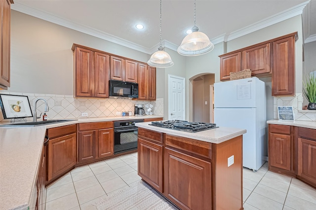 2500 Amy Lee Dr, Conroe, TX 77304 - kitchen with black appliances, light tile patterned floors, arched walkways, backsplash, and ornamental molding