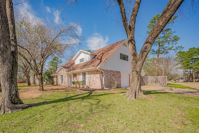 9602 John Bank Dr, Spring, TX 77379 - view of property exterior featuring brick siding and concrete driveway