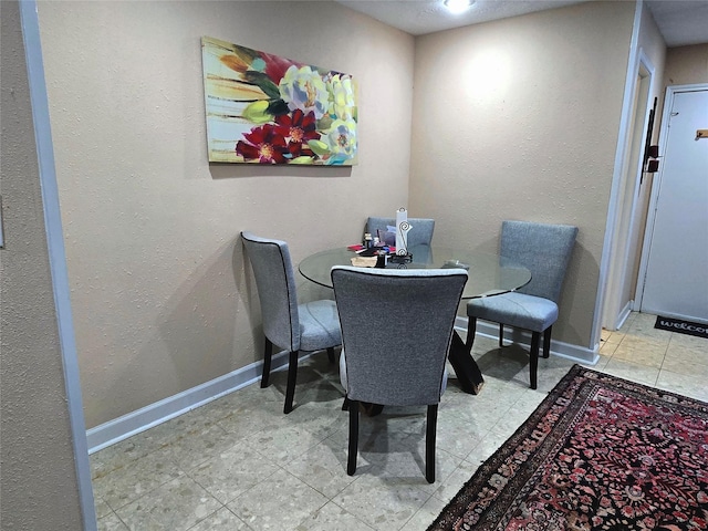 2503 Mccue Rd Unit 13, Houston, TX 77056 - dining space with baseboards