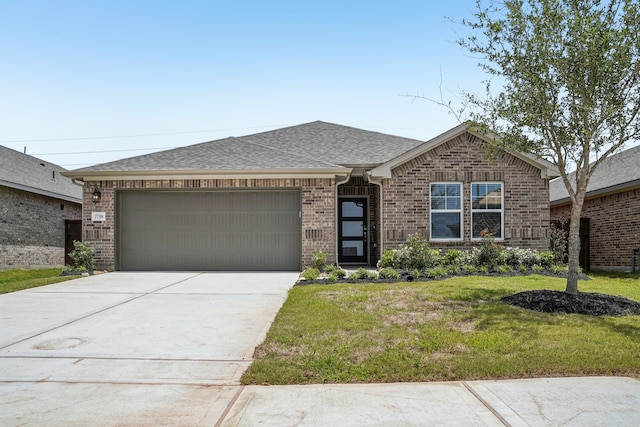 7738 Beaufort Ln, Baytown, TX 77523 - ranch-style home with an attached garage, brick siding, a front yard, concrete driveway, and roof with shingles
