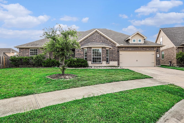 30710 Basil Trace Dr, Spring, TX 77386 - view of front of house with brick siding, concrete driveway, an attached garage, and roof with shingles