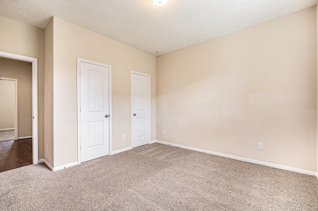 30710 Basil Trace Dr, Spring, TX 77386 - unfurnished bedroom featuring carpet floors and baseboards