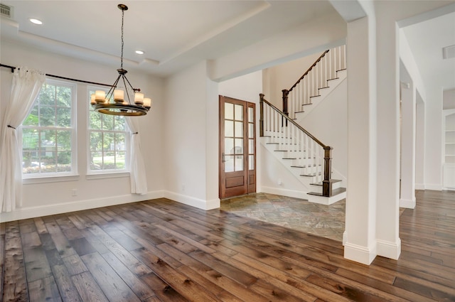 2209 Macarthur St, Houston, TX 77030 - foyer entrance featuring dark wood-style floors, recessed lighting, a chandelier, baseboards, and stairs