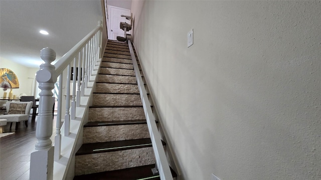 1805 Stoney Brook Dr Unit 103, Houston, TX 77063 - staircase with wood finished floors, recessed lighting, and a textured wall