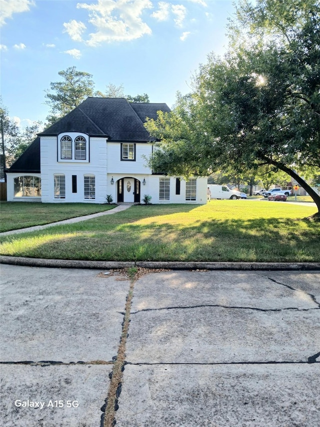 17931 Elk River Cir, Houston, TX 77090 - view of front of home with a front yard