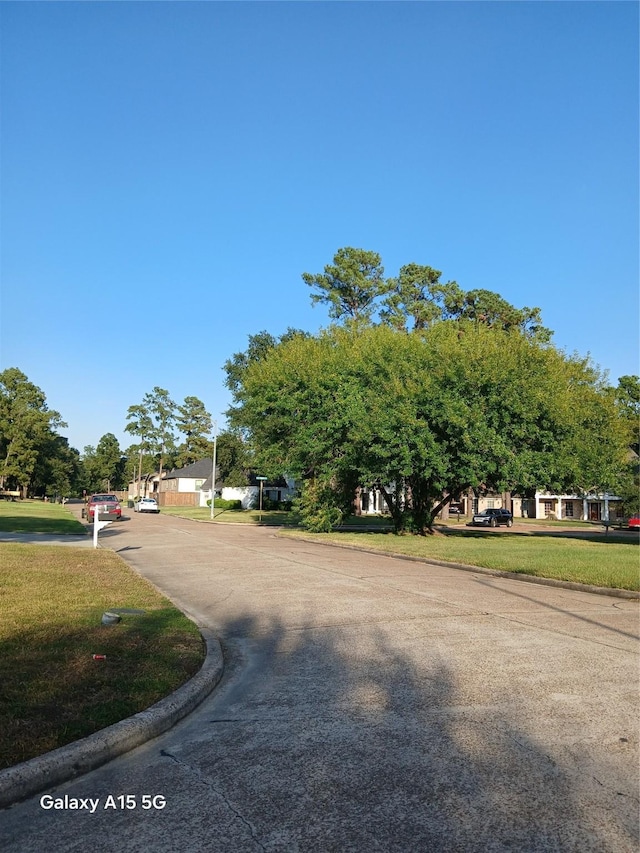 17931 Elk River Cir, Houston, TX 77090 - view of front of property with a front yard