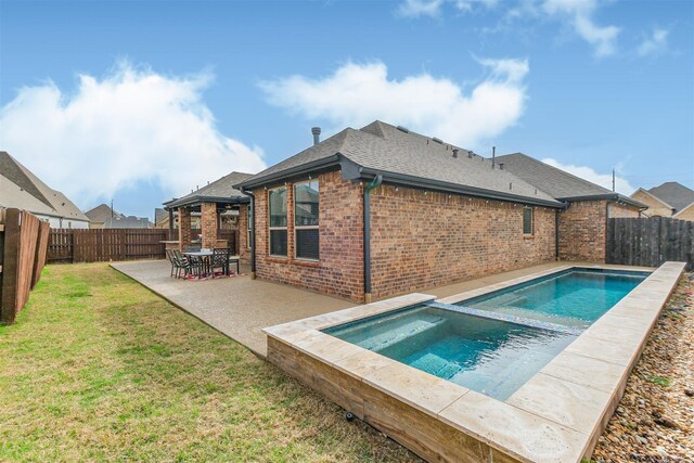 23202 Brookdale Bay Ln, Katy, TX 77493 - view of swimming pool with a patio area and a pool with connected hot tub