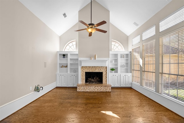 6910 Amber Ct, Houston, TX 77069 - unfurnished living room featuring high vaulted ceiling, ceiling fan, a fireplace, wood finished floors, and baseboards