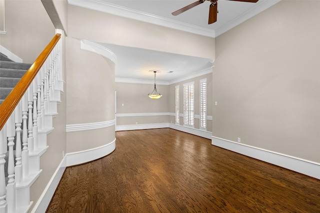 6910 Amber Ct, Houston, TX 77069 - unfurnished room featuring ornamental molding, wood finished floors, a ceiling fan, stairs, and baseboards