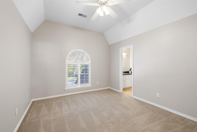 6910 Amber Ct, Houston, TX 77069 - empty room featuring light carpet, a ceiling fan, lofted ceiling, and baseboards