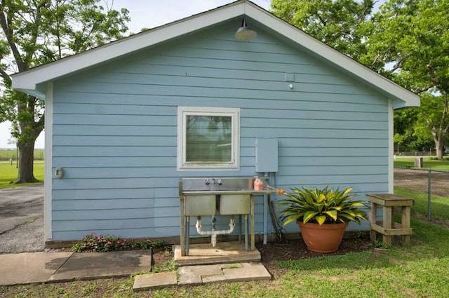 450 County Road 206, Sargent, TX 77414 - rear view of house featuring fence