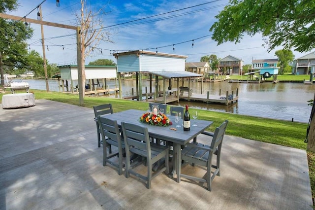 450 County Road 206, Sargent, TX 77414 - view of patio / terrace featuring a dock, outdoor dining area, boat lift, and a water view