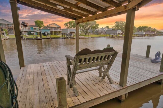450 County Road 206, Sargent, TX 77414 - dock featuring a water view and a residential view