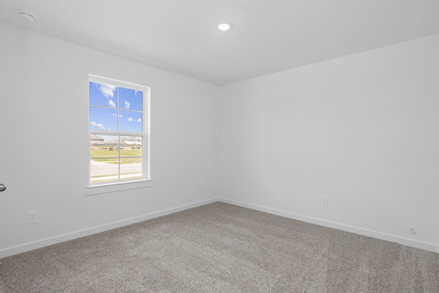 305 Robin St, Angleton, TX 77515 - carpeted spare room with baseboards, a smoke detector, and recessed lighting