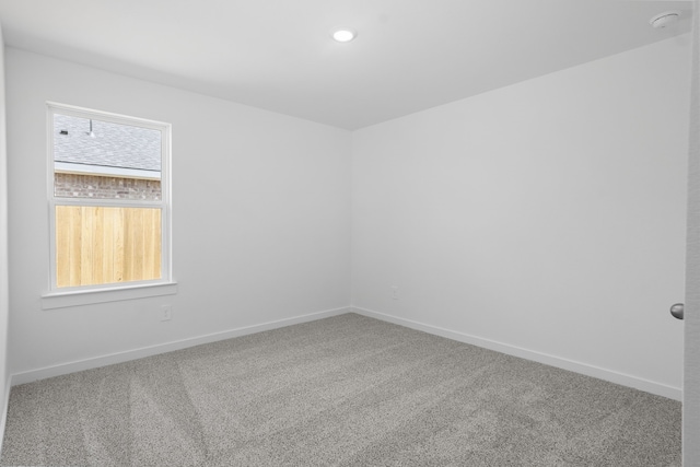 305 Robin St, Angleton, TX 77515 - carpeted spare room featuring baseboards and recessed lighting
