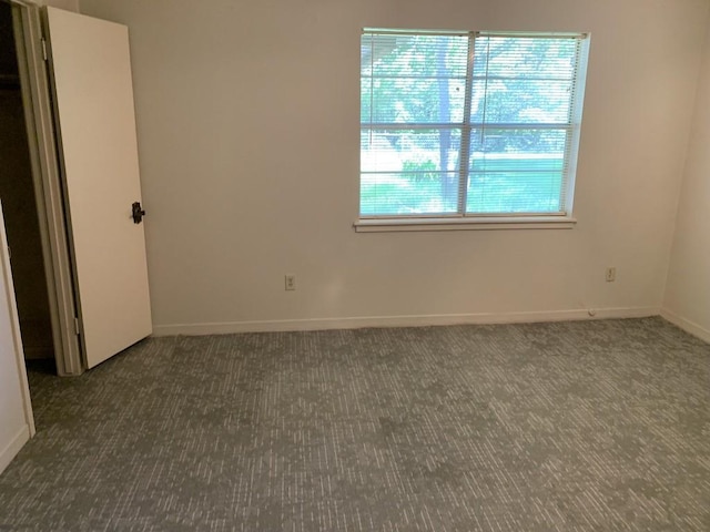 26405 Easy St, Magnolia, TX 77355 - carpeted spare room featuring baseboards