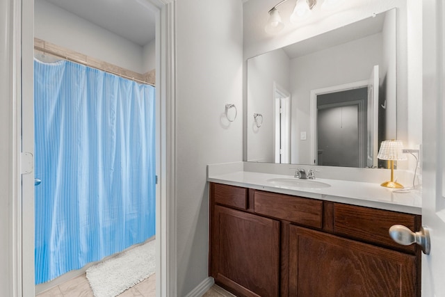 819 Spruce Pine Dr, Conroe, TX 77318 - bathroom featuring vanity and curtained shower