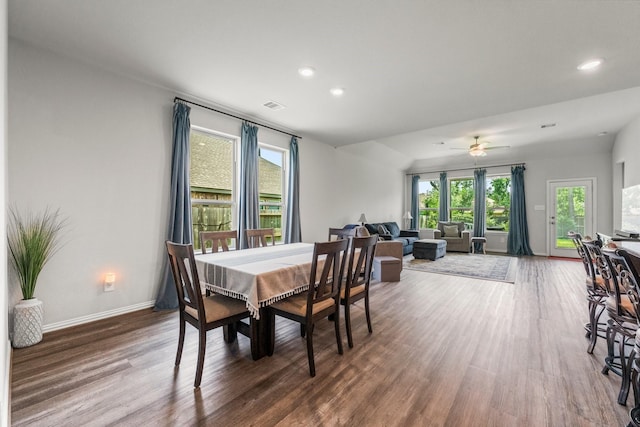 819 Spruce Pine Dr, Conroe, TX 77318 - dining room with healthy amount of natural light, wood finished floors, baseboards, recessed lighting, and a ceiling fan