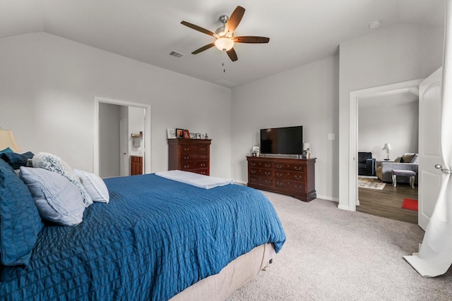 819 Spruce Pine Dr, Conroe, TX 77318 - carpeted bedroom with vaulted ceiling and ceiling fan